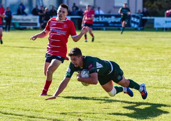 Bailey Donaldson crosses the line for Hawicks sixth try 15 minutes from the end. Photograph: Paul Devlin/SNS Group/SRU