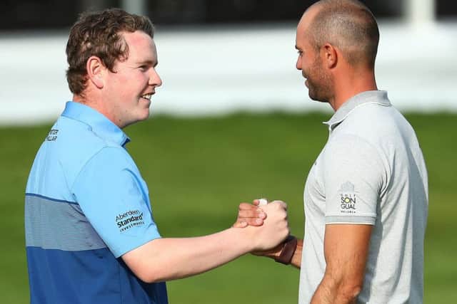 Bob MacIntyre, left, and Bernd Ritthammer are the joint leaders heading into the final round of the Porsche European Open in Hamburg. Picture: Matthew Lewis/Getty Images