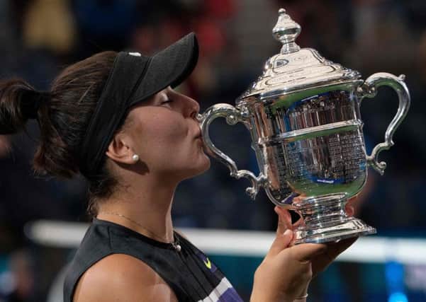 Bianca Andreescu kisses the trophy  following her  6-3, 7-5 victory over Serena Williams in the womens final at the US Open. Picture: AFP/Getty
