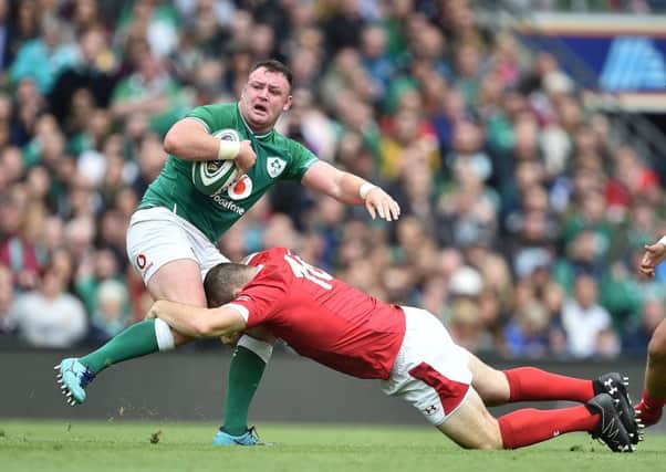 Dave Kilcoyne is tackled by Ken Owens during Irelands 19-10 win over Wales on Saturday. Picture: Getty.
