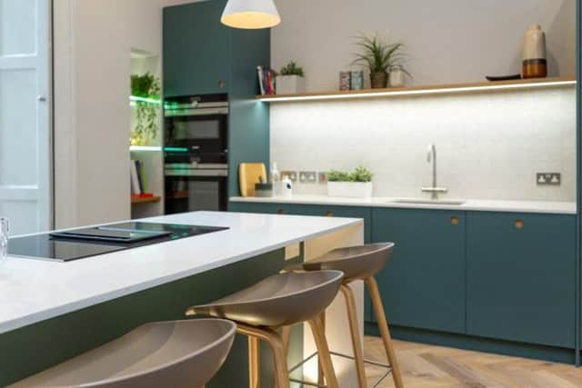 The kitchen includes integrated Siemens appliances and a Franke 3 in 1 boiling water tap, Italian porcelain tiling and separate utility / larder space.