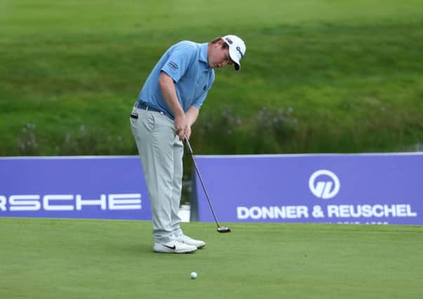 Bob MacIntyre putts for an eagle on the 18th green on the final day of the European Open, but his effort landed agonisingly short, leaving the Scot to finish second. Picture: Getty