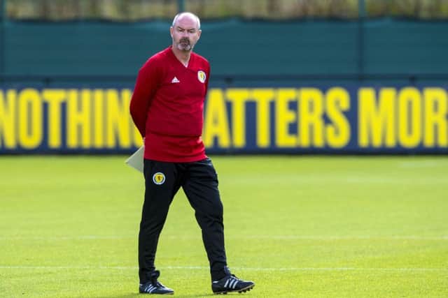 Steve Clarke oversees a training session at Oriam yesterday as his Scotland team prepare to face Belgium. Picture: SNS.