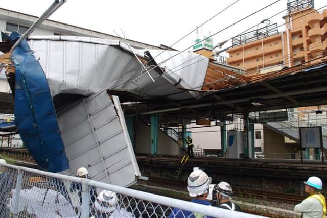 A typhoon blew across the Tokyo metropolitan area on Monday morning