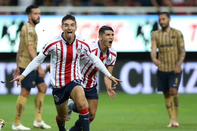 Isaac Brizuela celebrates a goal for Guadalajara