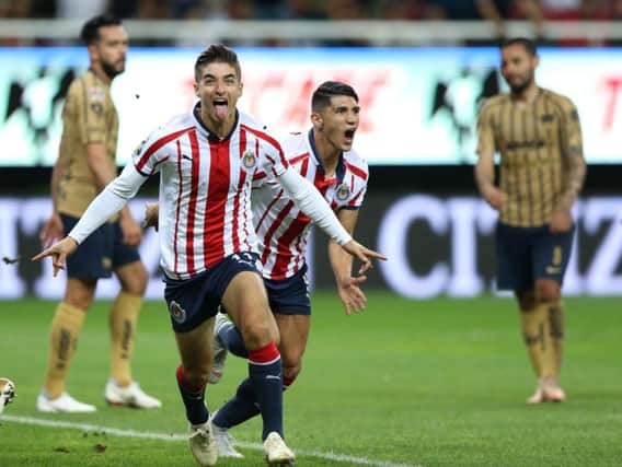 Isaac Brizuela celebrates a goal for Guadalajara