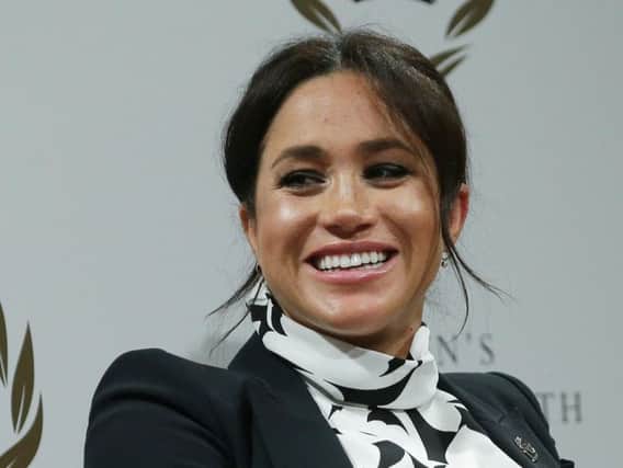 Meghan has reached "the pinnacle of the greasy pole", according to the society magazine.