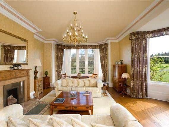 The living room is one of six reception rooms in the tower.
