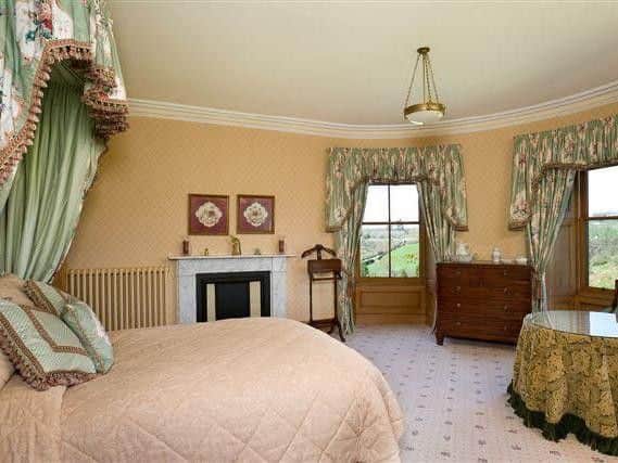 One of the six bedrooms.