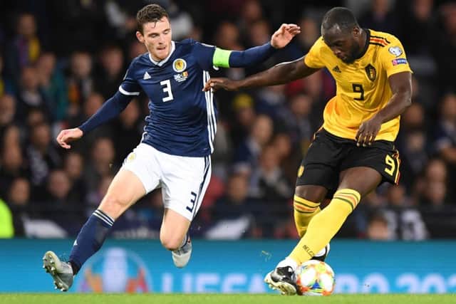 Andrew Robertson battles with Belgium striker Romelu Lukaku during Scotland's 4-0 defeat at Hampden. Picture: Andy Buchanan/AFP/Getty Images