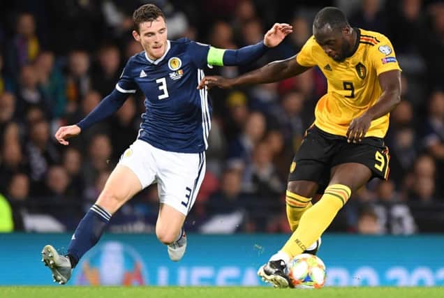 Andrew Robertson battles with Belgium striker Romelu Lukaku during Scotland's 4-0 defeat at Hampden. Picture: Andy Buchanan/AFP/Getty Images