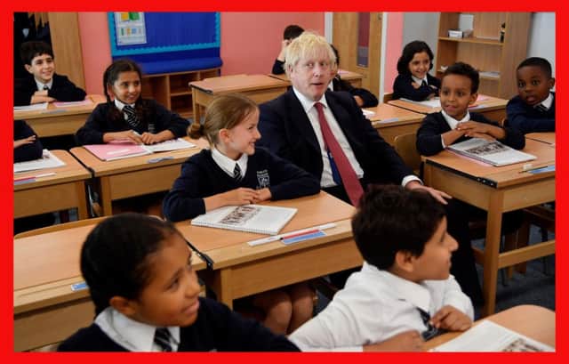 Prime Minister Boris Johnson during a visit to Pimlico Primary school in South West London, to meet staff and students and launch an education drive which could see up to 30 new free schools established. PA Photo.