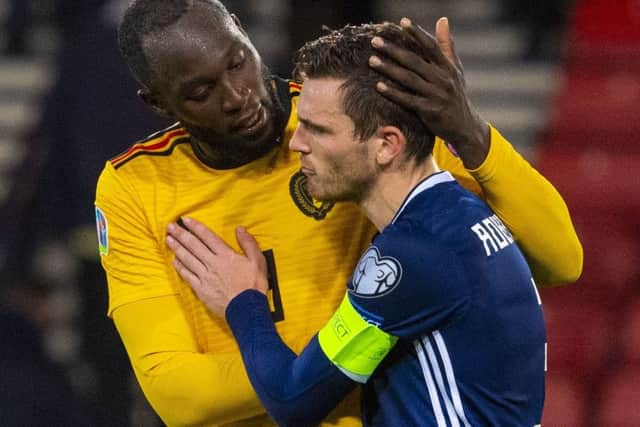 Romelu Lukaku consoles Scotland captain Andy Robertson after Belgium's 4-0 win at Hampden