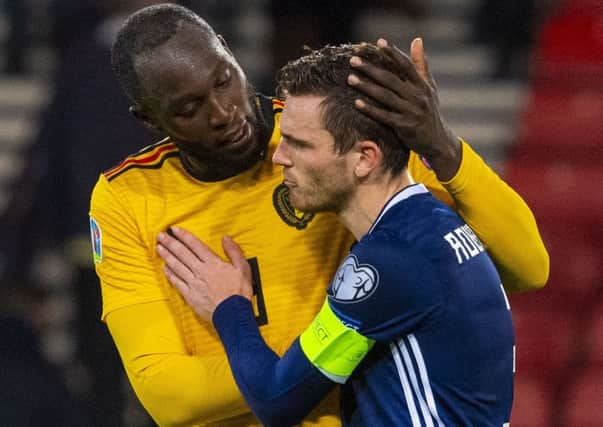 Romelu Lukaku consoles Scotland captain Andy Robertson after Belgium's 4-0 win at Hampden