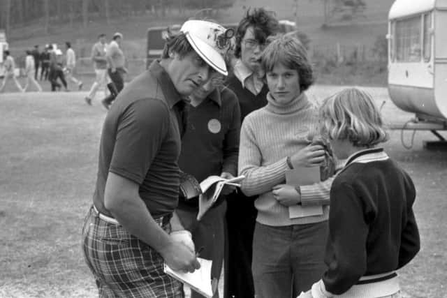 Barnes signs autographs for some children at the 1977 Scottish Open at Turnberry