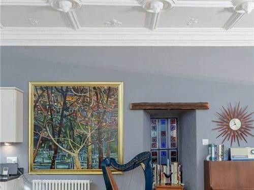 Features include sash and case windows with working shutters.