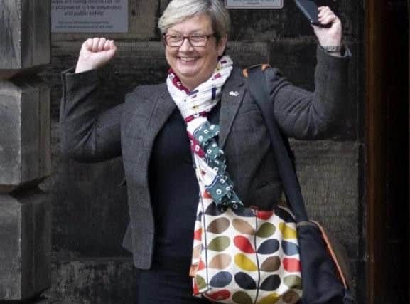 SNP MP Joanna Cherry celebrates at the Court of Session