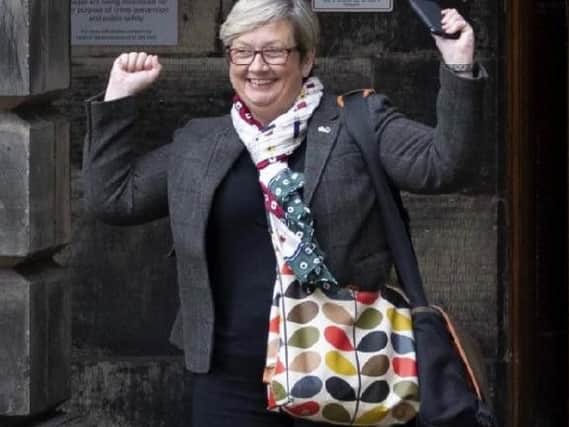 SNP MP Joanna Cherry celebrates at the Court of Session