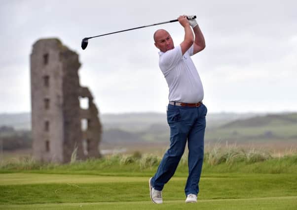Scottish captain Matt Clark drives at the 13th tee during day one of  the Home Internationals at Lahinch. Picture: Courtesy of GUI