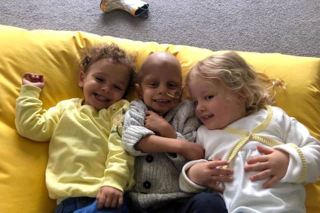 Caleb, who was diagnosed with a rare brain cancer, with sisters Poppy and Alyssia. Picture: SWNS