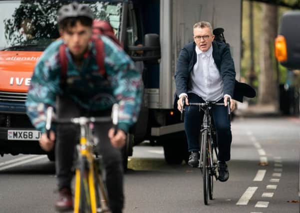 Tom Watson demonstrates his dedication to active travel as he cycles to Londons Somerset House to give a speech about Brexit, but its his dieting prowess that interests Kevan Christie (Picture: Adam Gray/SWNS)