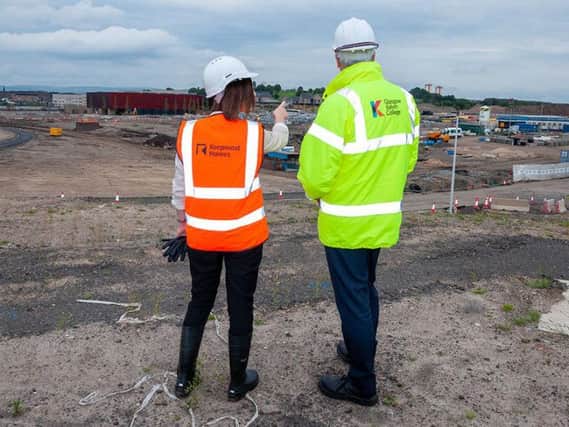 Keepmoat's Beth McNeil with Glasgow Kelvin College principal Derek Smeall at the Sighthill development in Glasgow. Picture: Contributed