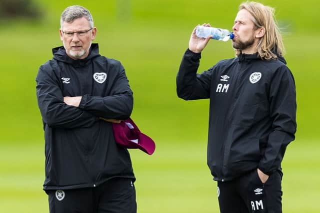 Hearts manager Craig Levein, left, and assistant Austin MacPhee oversee training. Picture; Roddy Scott/SNS