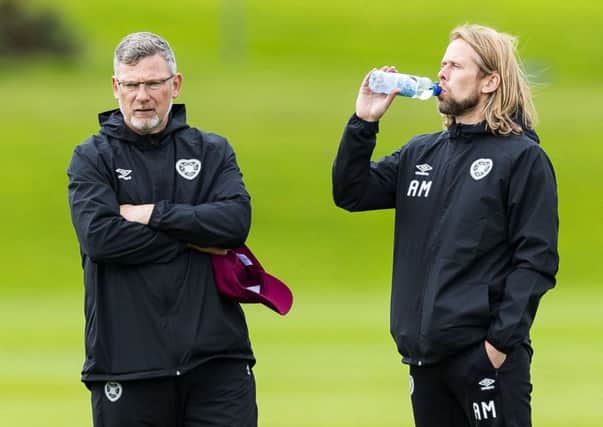 Hearts manager Craig Levein, left, and assistant Austin MacPhee oversee training. Picture; Roddy Scott/SNS