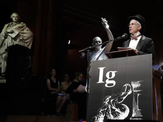 Marc Abrahams presides over hte 29th annual Ig Nobel awards ceremony at Harvard University. AP Photo/Elise Amendola
