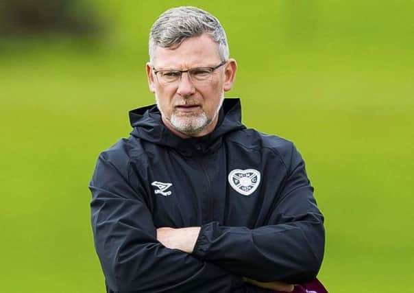 Craig Levein supervises training ahead of the game against Motherwell. Picture: Roddy Scott/SNS