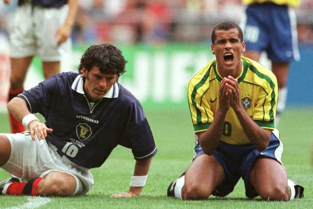 Scotland's Darren Jackson and Rivaldo during the opening game of the 1998 World Cup. Picture: Laurent Rebours/AP