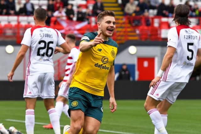 James Forrest wheels away after opening the scoring.