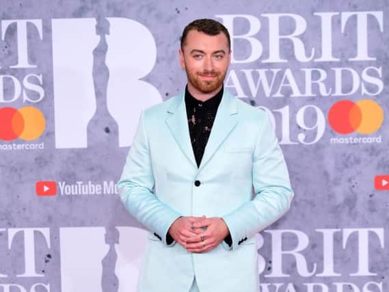 Sam Smith has asked fans to refer to them using the pronouns they/them - six months after coming out as non-binary.
