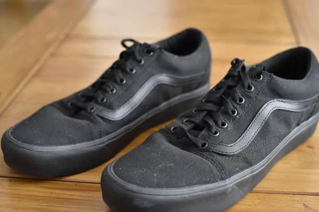 Nicki Mawby, 35, from Whittlesey, Cambridgeshire, insists her son Tyler Hickin's black Vans do not breach the guidelines.