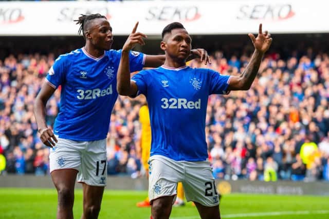Morelos and Arribo celebrate at Ibrox.