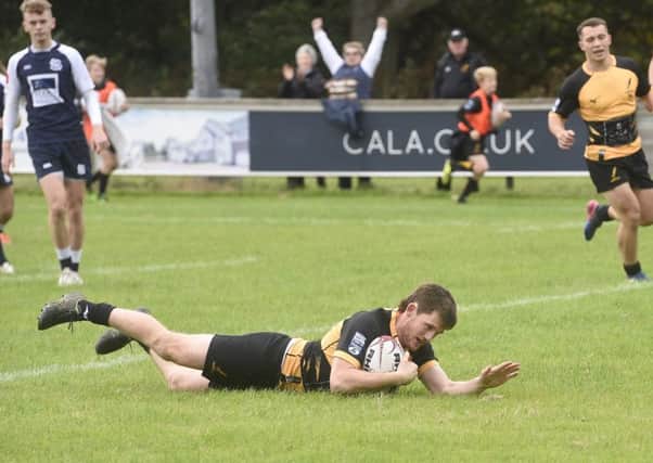 Currie's Gregor Christie scores a try against Selkirk. Picture: Greg Macvean