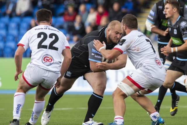 Glasgow Warriors' Adam Nicol takes the game to Ulster at Scotstoun. Picture: Paul Devlin/SNS