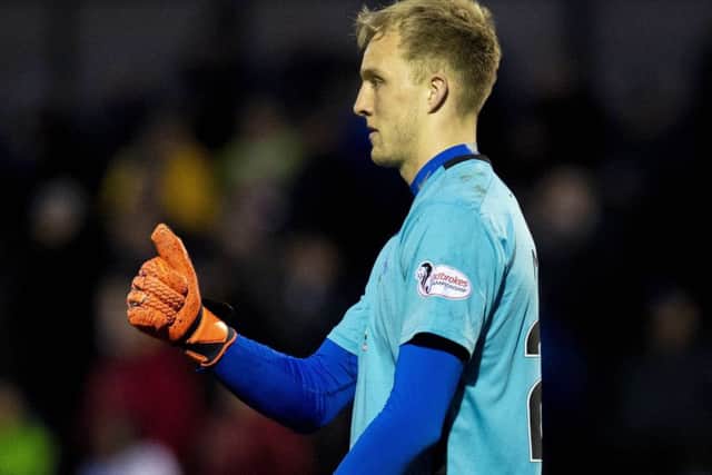 Goalkeeper Robby McCrorie was the hero for Queen of the South. Picture: Ross MacDonald/SNS Group