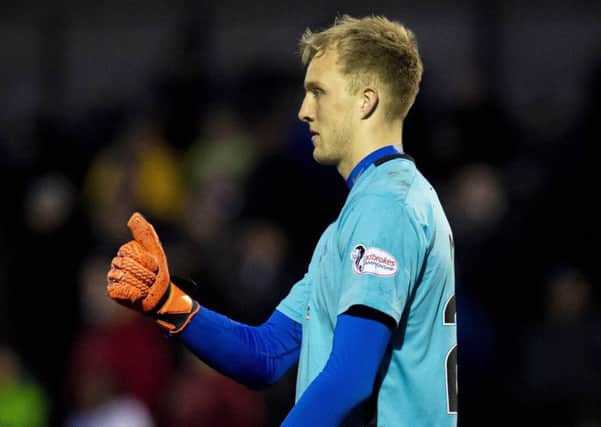 Goalkeeper Robby McCrorie was the hero for Queen of the South. Picture: Ross MacDonald/SNS Group