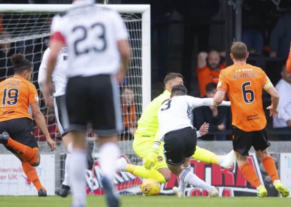 Daniel Harvie fires home to make it 1-0 for Ayr United against the league leaders.  Photograph:Garry Williamson/SNS Group