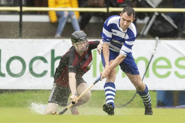 Oban's Daniel Sloss and Newtonmore's Michael Russell at the Tulloch Homes Camanachd Cup Final. Picture: Neil Paterson