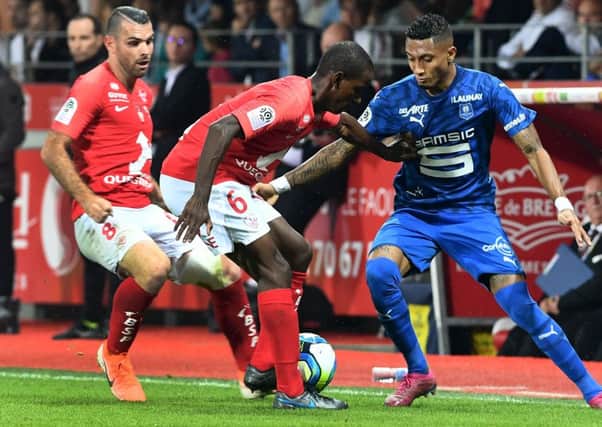 Rennes' Brazilian forward Raphinha, right, in action against Brest.  Picture: AFP/Getty Images