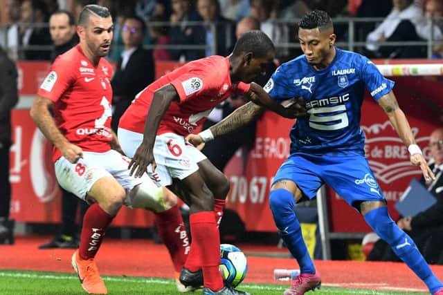 Rennes' Brazilian forward Raphinha, right, in action against Brest. Picture: AFP/Getty Images