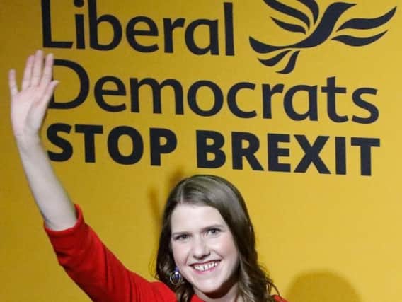 Liberal Democrat leader Jo Swinson waves on stage at an event annoucing the result of the leadership contest in central London on July 22, 2019. Picture: Getty Images