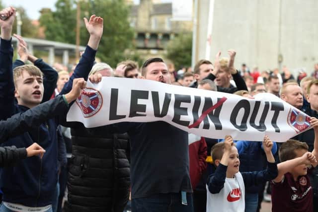 Hundreds of Hearts fans gather outside the main stand after Saturdays 3-2 defeat by Motherwell to protest against manager Craig Levein. Picture: SNS.