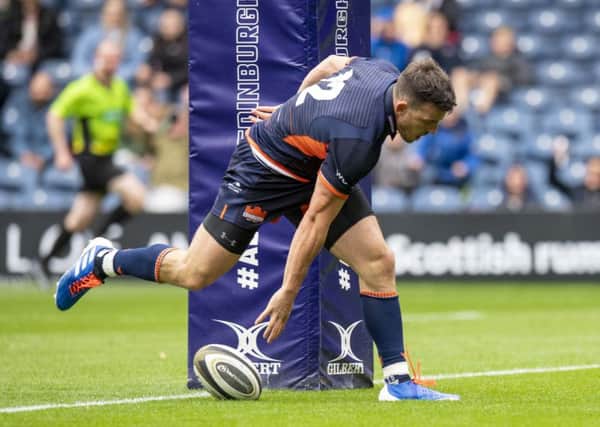 Matt Scott scores his second try for Edinburgh, but his his side were thwarted by a late touchdown by Ospreys on Saturday. Picture: SNS/SRU.
