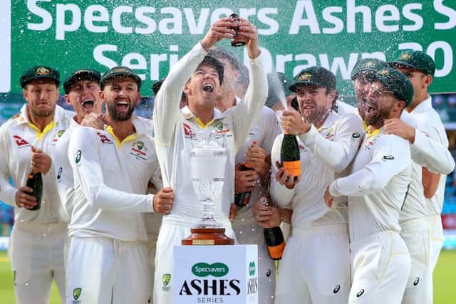 Australia players celebrate retaining the Ashes at the end of the fifth Test at The Kia Oval. Picture: Mike Egerton/PA Wire