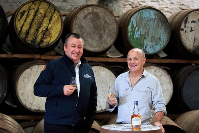 Pulteney Distillery manager Malcom Waring (left) with cameraman Doug Allan. Picture: Roddy MacKay