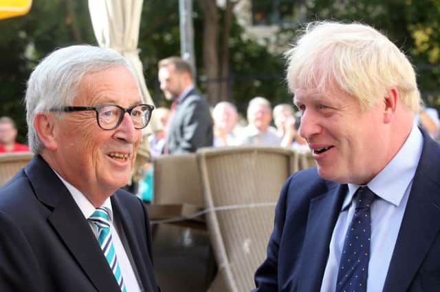 EU Commission president Jean-Claude Juncker (L) welcomes British Prime Minister Boris Johnson (R) prior to their meeting. Picture: FRANCOIS WALSCHAERTS/AFP/Getty Images