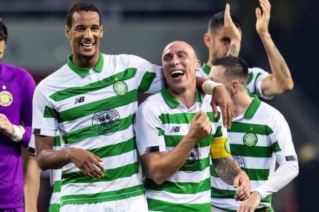 Celtic pair Scott Brown and Christopher Jullien celebrate the Europa League play-off win against AIK. Picture: Craig Williamson/SNS